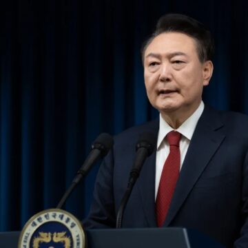 South Korea’s ruling party backs impeachment as president refuses to step down over martial law